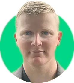 Headshot of Byron Green on bright green background